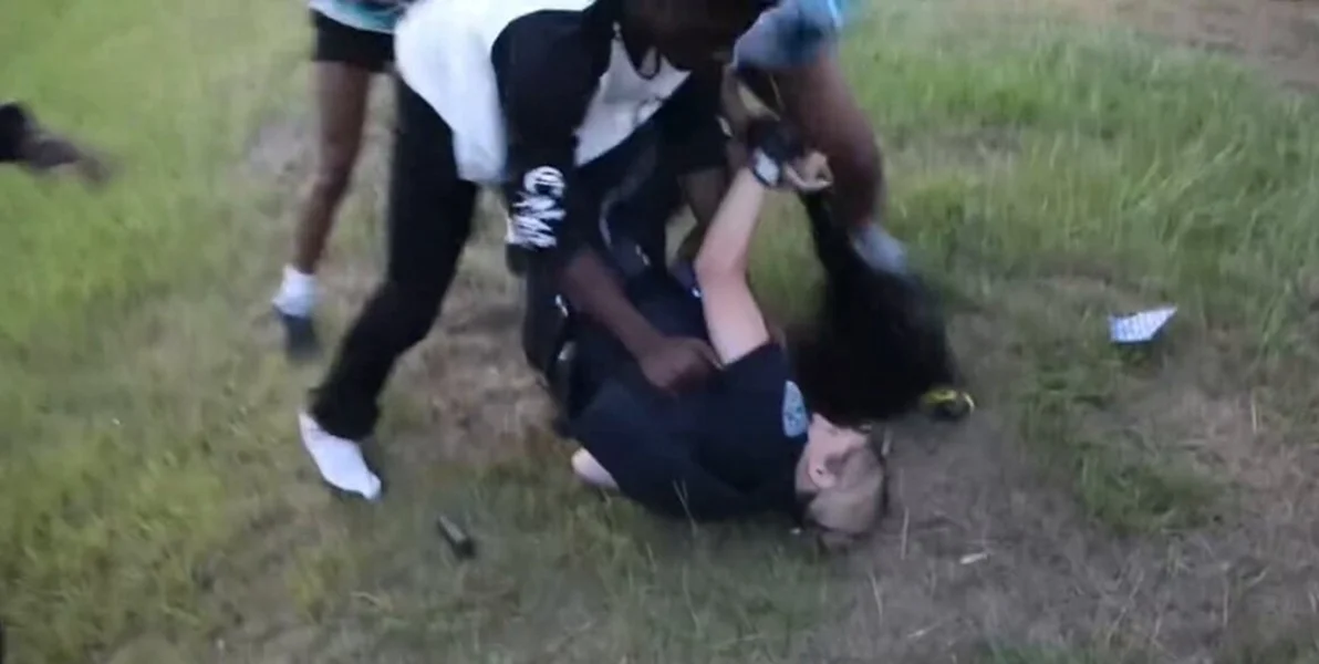 Low IQ future felons beat up a female cop