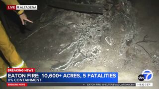 Reporter shows car where metal has melted along the ground