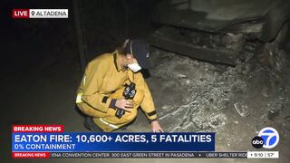 Reporter shows car where metal has melted along the ground