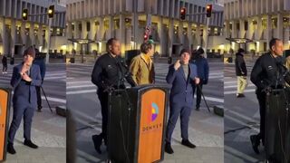 Angry pedestrian screams at Denver Mayor