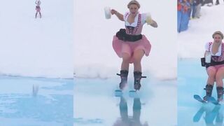 Woman goes skiing with two giant beer mugs