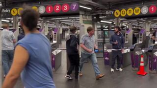 Dude pushes back on subway fare jumpers