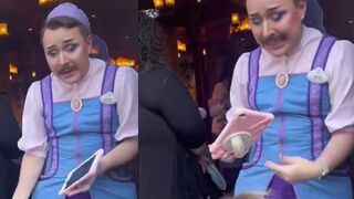 Disney has a MAN in a dress as the Fairy Godmother