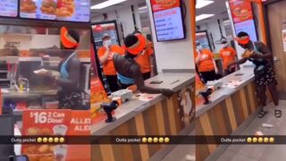 Woman climbs over counter for free chicken