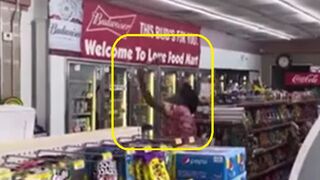 Welfare queen starts breaking bottles in store