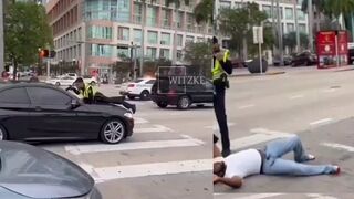 Driver hits cop, who then fires gun through windshield