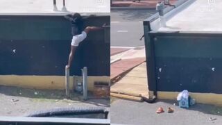 Criminal falls off building