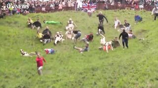 Man goes AIRBORN chasing a cheeseball down steep 200-yard hill