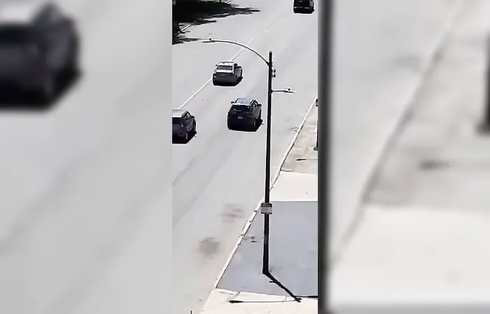 Dude throws rocks at car, instantly regrets it