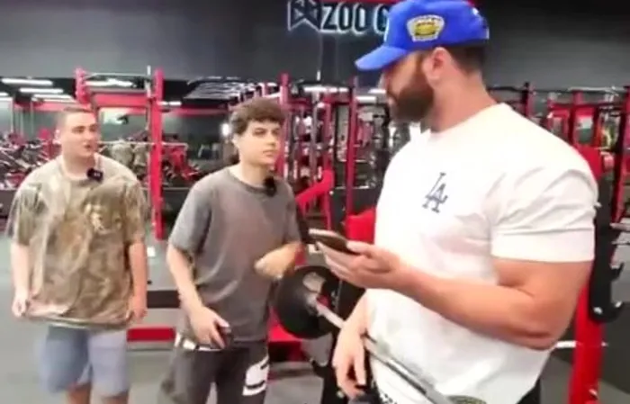 Streamer steals a bodybuilders hat at the gym, gets SLAPPED in the face