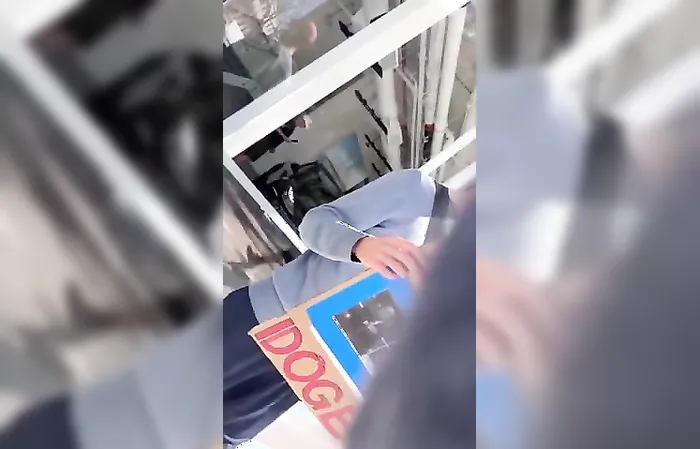 Protester admits being paid on camera