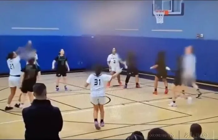 Giant male injures 3 girls during basketball game, coach throws in the towel