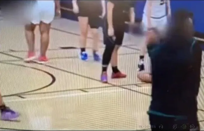Giant male injures 3 girls during basketball game, coach throws in the towel