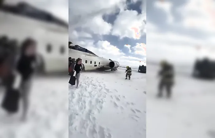 Passengers walk on ceiling to exit upside-down Delta plane that filpped over