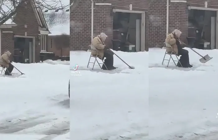 Woman records old man shoveling snow instead of helping him