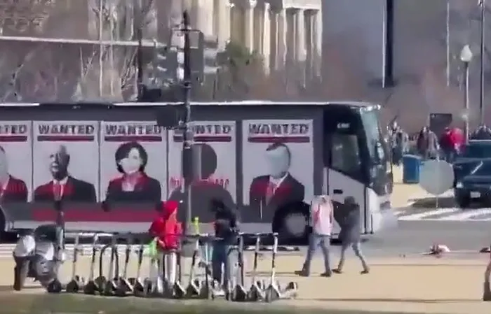 Bus has 'WANTED' posters of Bill Gates, Fauci, Schwab, and others