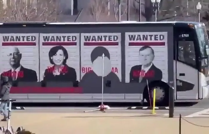 Bus has 'WANTED' posters of Bill Gates, Fauci, Schwab, and others