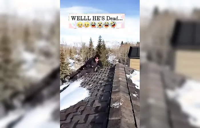 Guy falls off roof while on the job