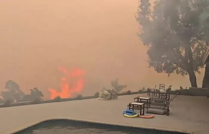 'Our deck three minutes ago" - James Woods shares wildfire video