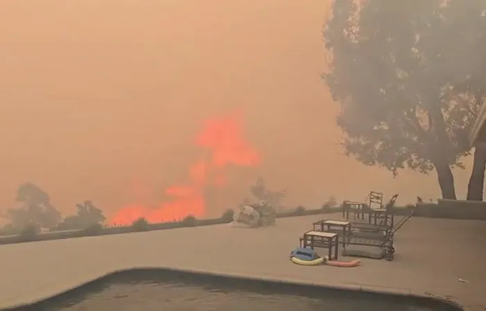 'Our deck three minutes ago" - James Woods shares wildfire video