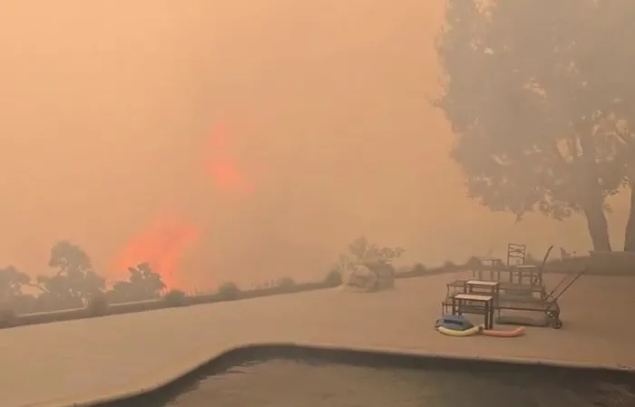 'Our deck three minutes ago" - James Woods shares wildfire video