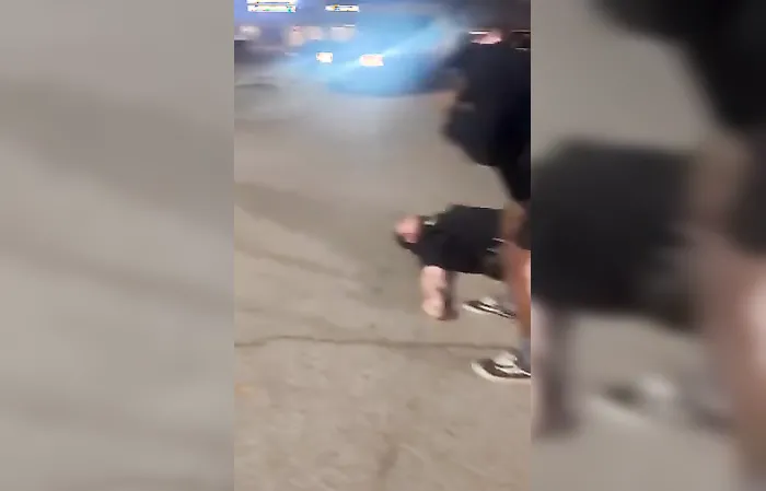 Cop jumps on back of car, woman speeds off and sends him flying