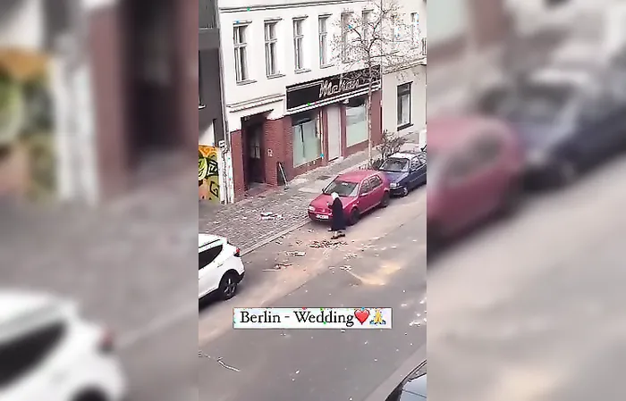 Elderly German woman cleaning after it got trashed on NYE