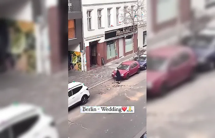 Elderly German woman cleaning after it got trashed on NYE