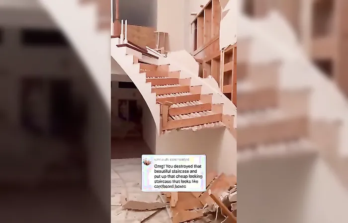 Couple gets rid of beautiful, curved stairwell for hideous new steps