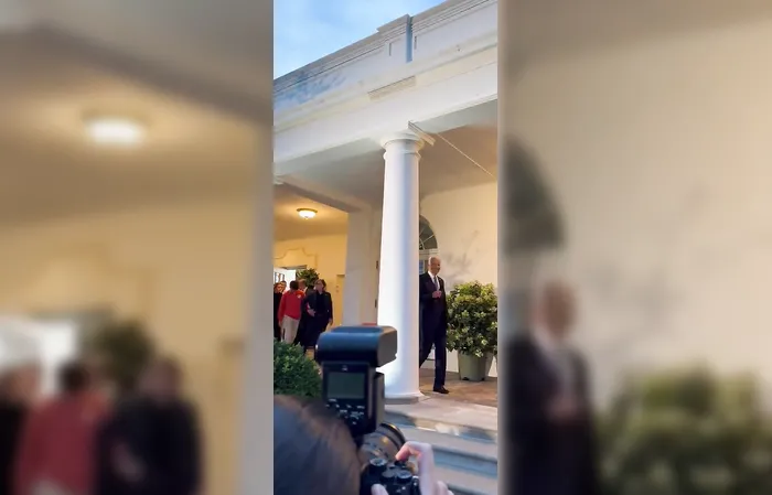Why does Joe Biden look so tall in this video?