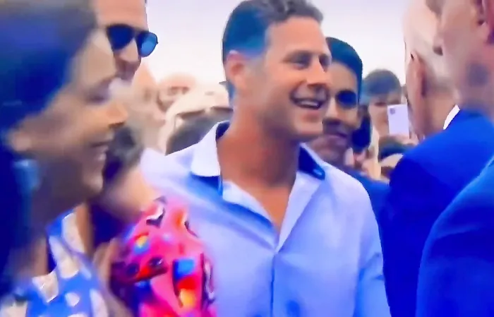 Little Girl Looks Terrified as Biden Appears To Nibble on Her Back