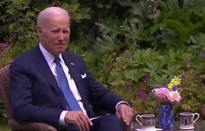 Joe Biden looks lost and confused while sipping tea