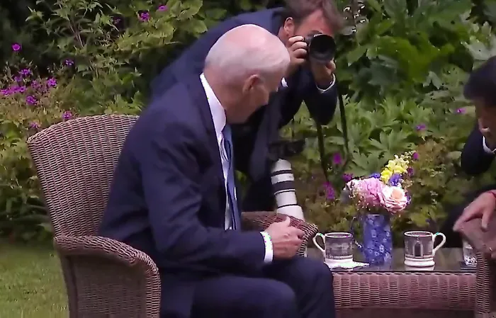 Joe Biden looks lost and confused while sipping tea
