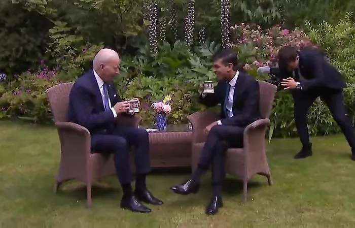 Joe Biden looks lost and confused while sipping tea