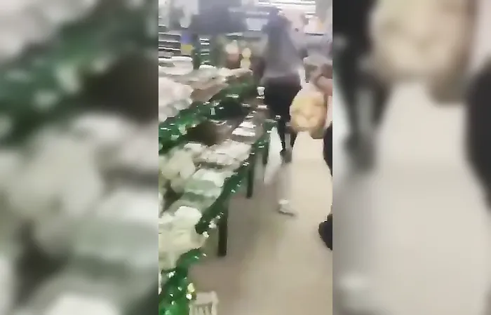 Big girl climbs all over the veggies in Walmart, cops get called
