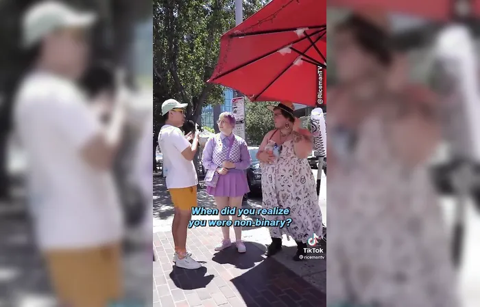 Dude with facial hair wearing a dress