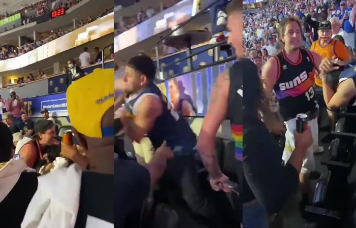 Suns fan takes on two Nuggets fans in most chill way possible