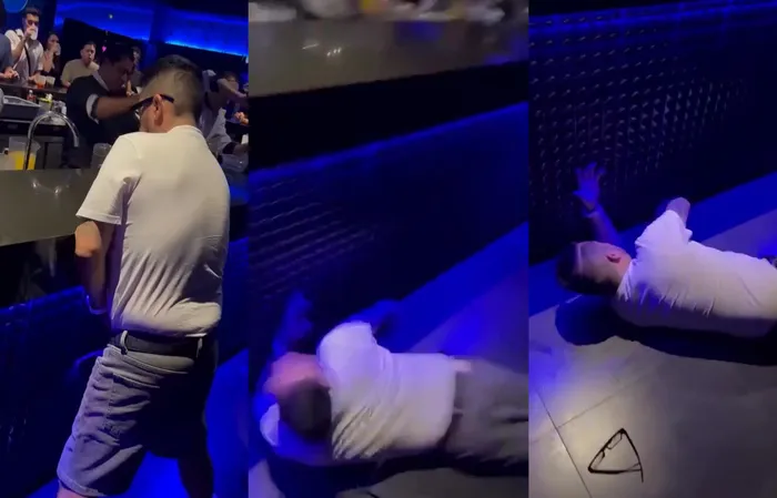 Drunk dude pisses at bar, then falls FACE FIRST INTO IT