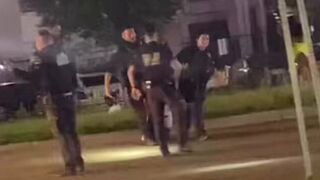 Cops DRAG woman to police cruiser after she refused to walk on her own