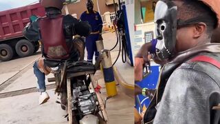 Dude drives a homemade motorcycle
