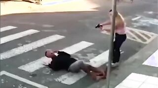 Woman takes out suspect in the streets