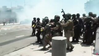 Law enforcement fires munitions at protesters in LA