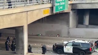 Protesters launch rocks at cop's heads during LA riots