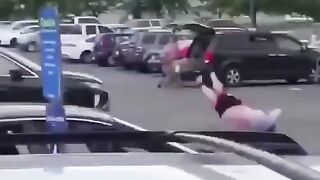 Dude gets hit by car TWICE, goes FLYING across parking lot