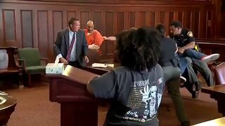 Brothers attacked their mom’s killer in court