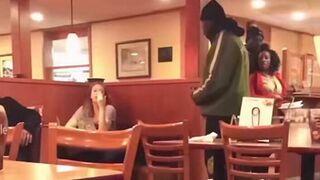Big dude gets in woman's face at Dennys