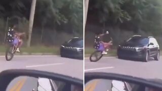 Wheelie-riding homie gets SLAPPED by a car
