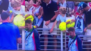 Piotr Szczerek stealing hat from a kid at tennis match