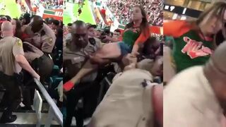 Woman at University of Miami game slaps cop as she's getting arrested, cop retaliates