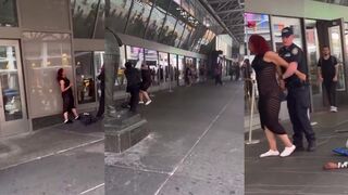 Is that a woman or a man in a dress?